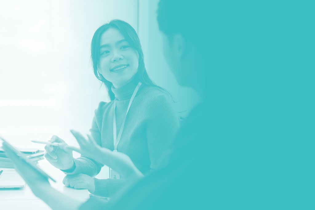 Woman talking to someone with an ipad in a Cyan/Teal gradient